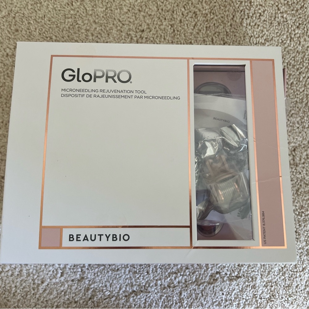 BeautyBio GloPRO microneedling rejuvenation tool with 4 face attachments